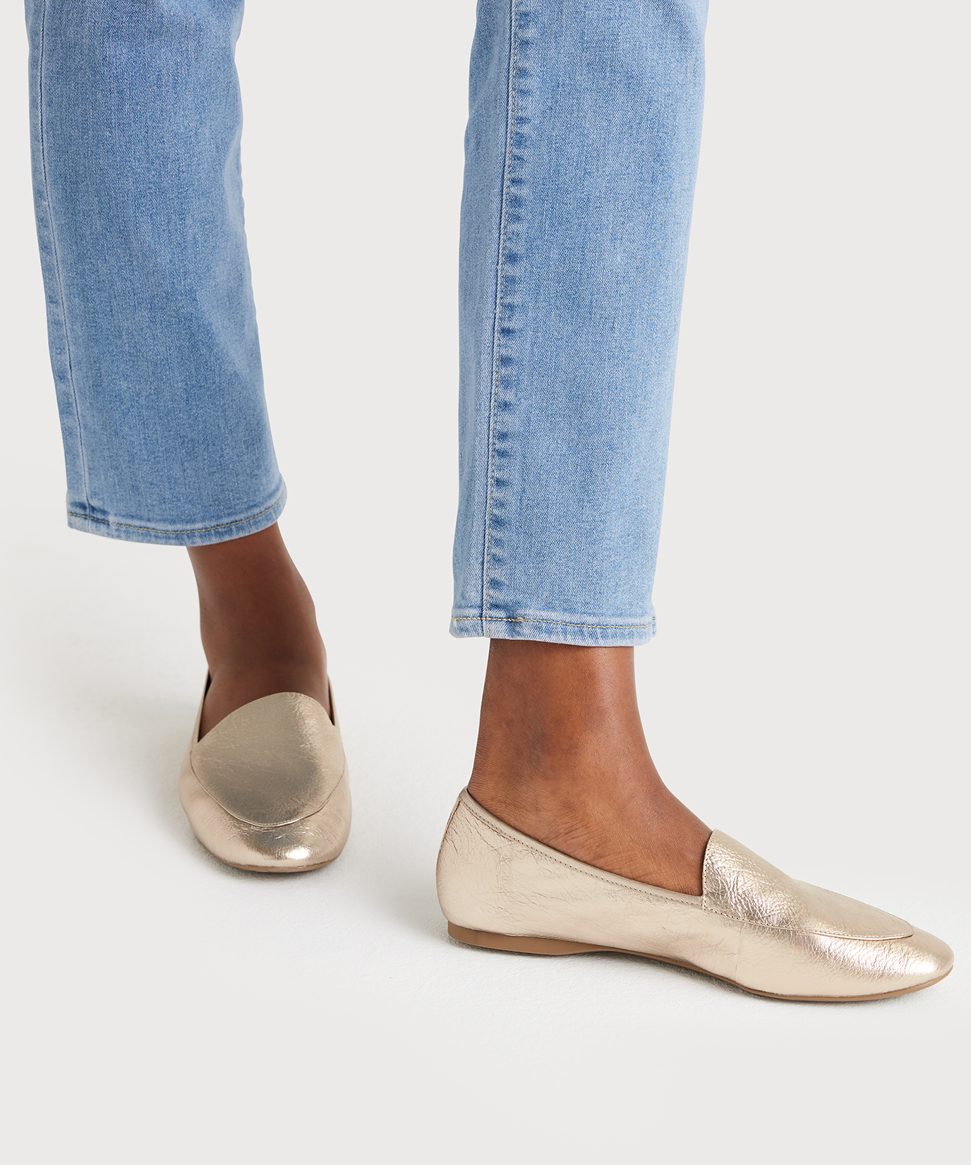 on figure top view of the Vesper loafer in Gold Leather