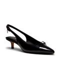 Black patent leather slingback kitten heel with pointed toe and delicate bow detail, featuring a glossy finish. Front angle view