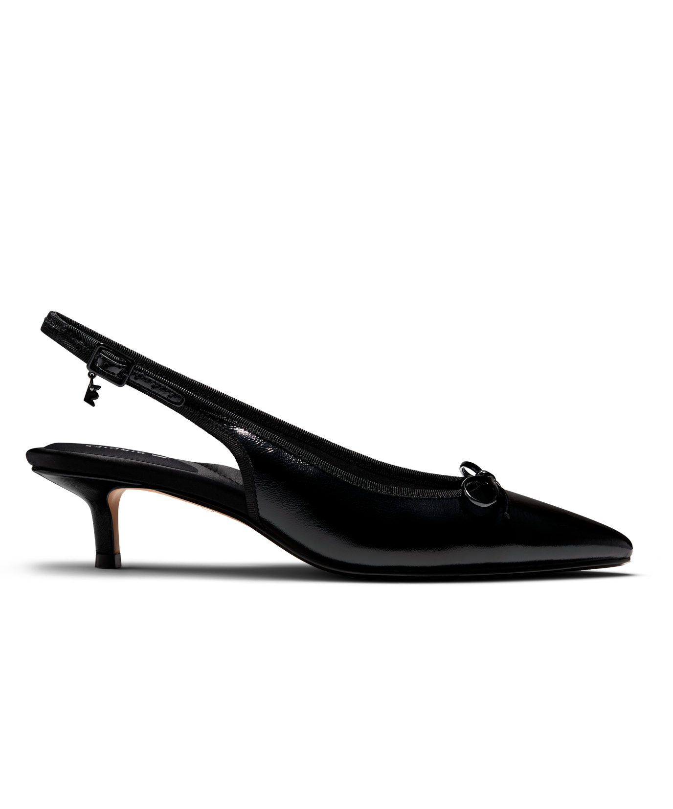 Black patent leather slingback kitten heel with pointed toe and delicate bow detail, featuring a glossy finish. Side view.