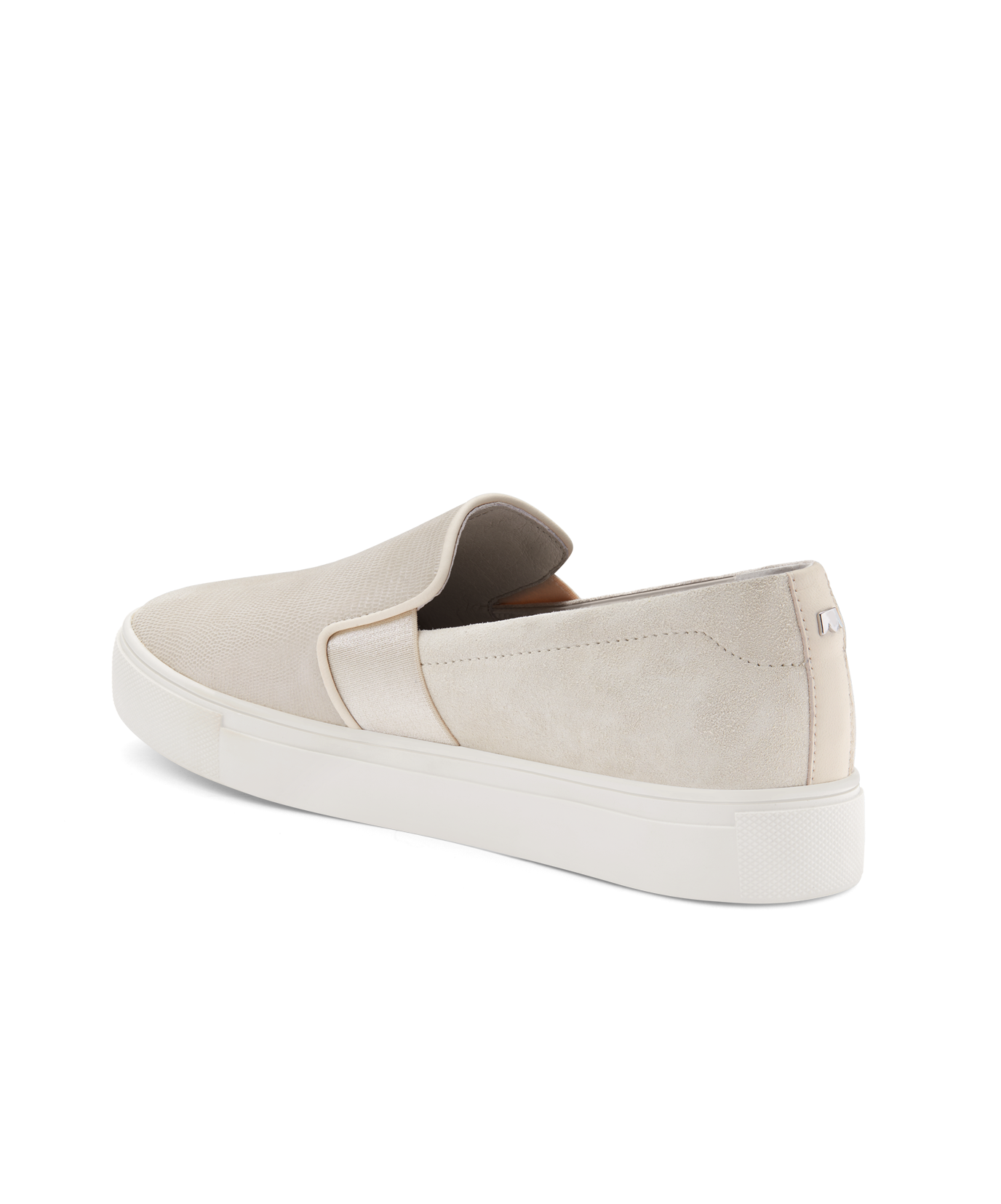 back 3/4ths view of the Swift Slip on Sneaker in Bone (cream) Embossed Leather