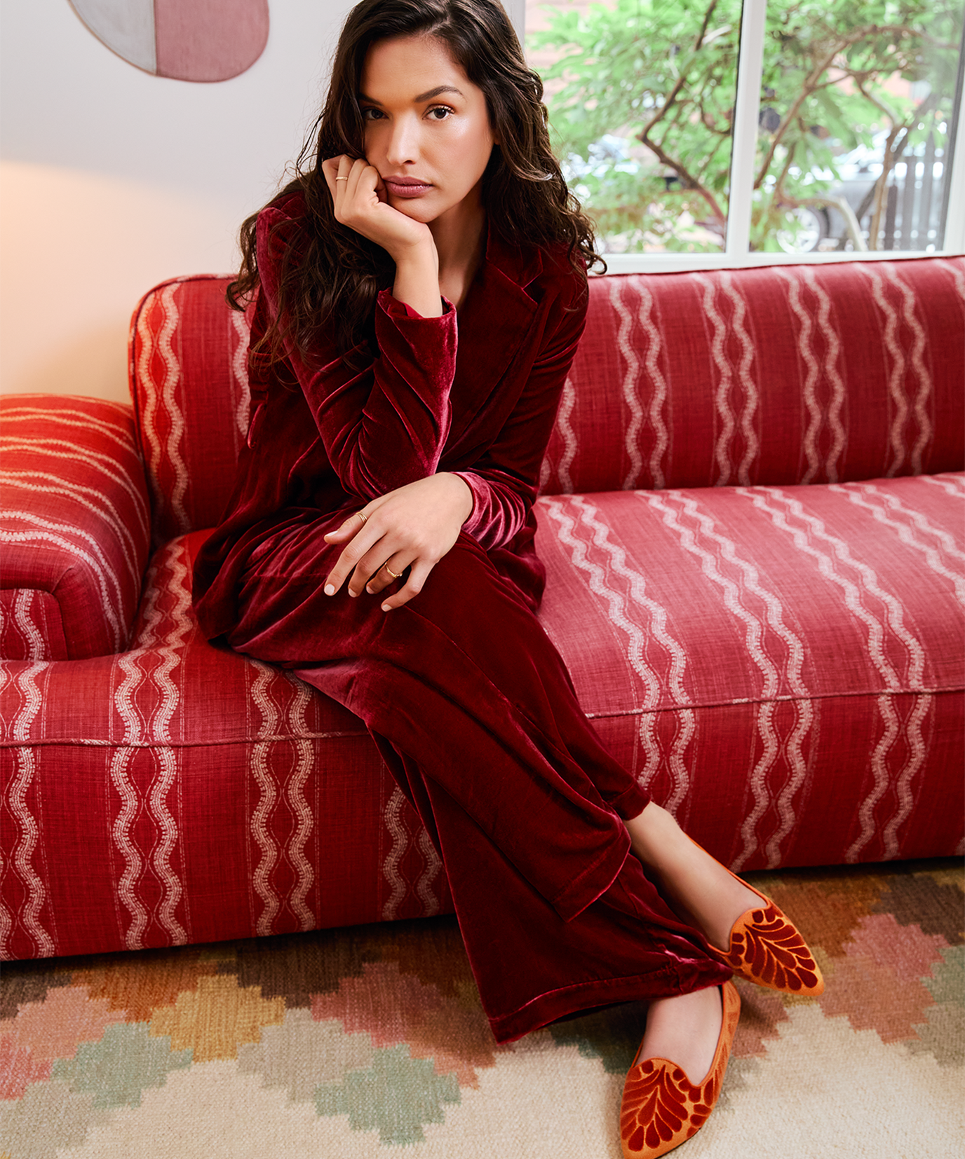 on figure top view of the Sparrow Loafer in Marigold (orange) Velvet Embroidery