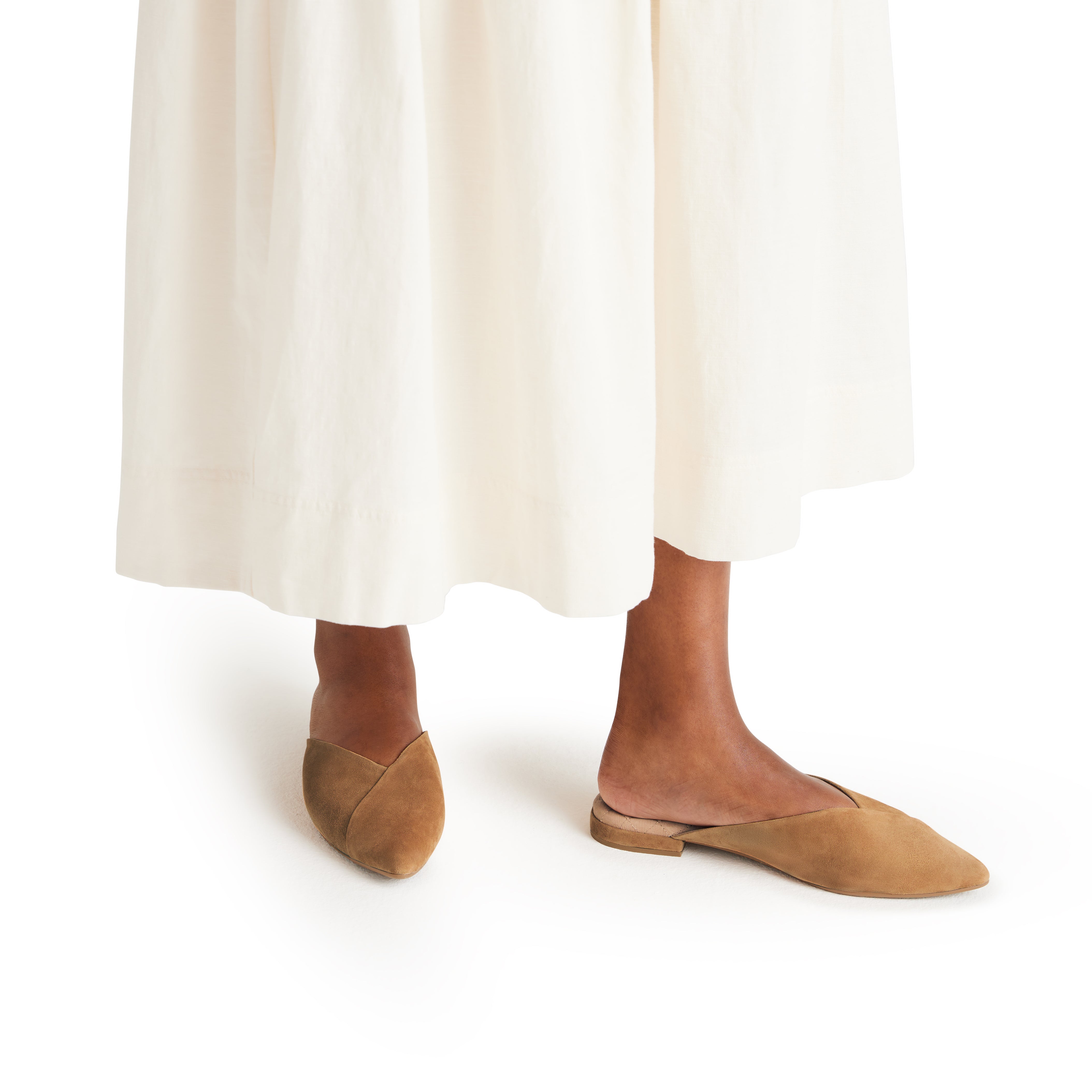 on figure top & side view of the Swan mule in Golden Oak (tan) Suede
