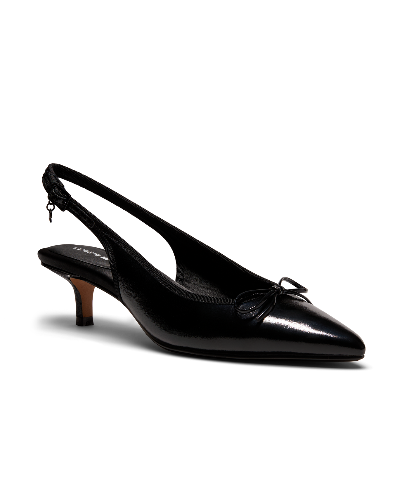 Black patent leather slingback kitten heel with pointed toe and delicate bow detail, featuring a glossy finish. Front angle view