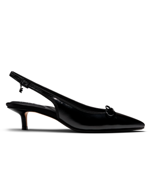 Black patent leather slingback kitten heel with pointed toe and delicate bow detail, featuring a glossy finish. Side view.