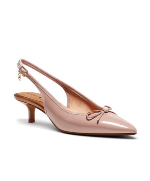 Pink patent leather slingback kitten heel with pointed toe and delicate bow detail, featuring a glossy finish. Front angle view.