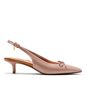 Pink patent leather slingback kitten heel with pointed toe and delicate bow detail, featuring a glossy finish. Side view