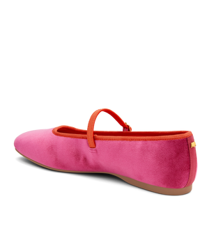 back 3/4ths view of the Hummingbird Maryjane in Hot Pink Velvet with an orange Leather strap