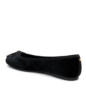 back 3/4ths view of the hummingbird in black velvet bow