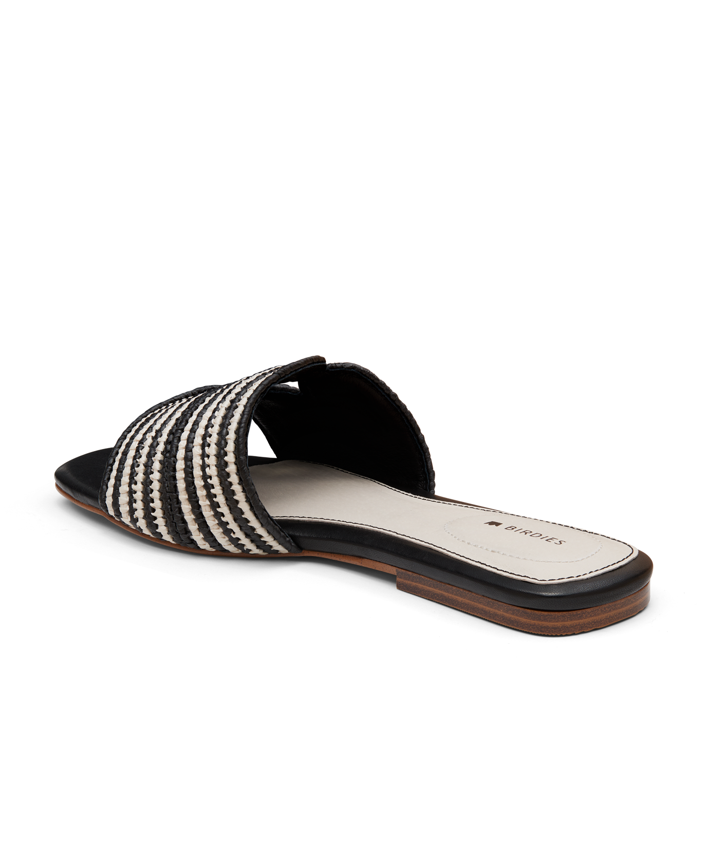 back 3/4ths view of the Kiwi sandal in Black & white Raffia