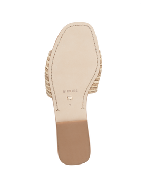 bottom view of the Kiwi Sandal in Sand (tan) raffia 