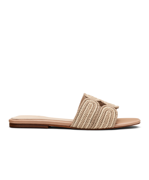 side view of the Kiwi Sandal in Sand (tan) raffia 