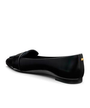 back 3/4ths view of the sparrow leather loafer in licorice (black)