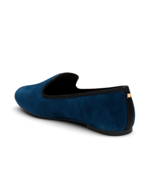 Navy suede classic loafer shoe with rounded toe, designed for comfort and style. Perfect for everyday wear. Back angled view.