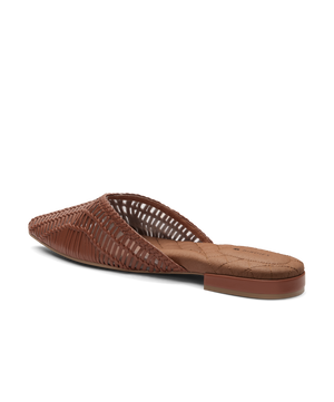 back 3/4ths view of the Swan mule in cognac (brown) woven